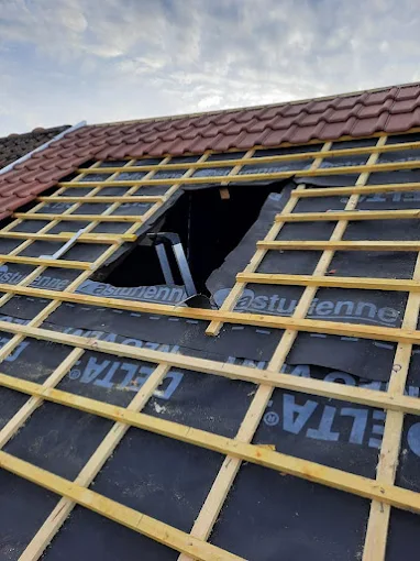 Toiture d'une maison à Roost-Warendin 59286