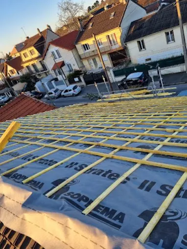 Toiture d'une maison de la commune Bachant